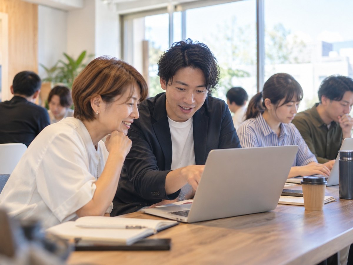 鹿児島AI実践会のイメージ(一緒に画面を見て相談する参加者)